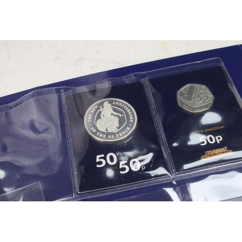 242 - A large collection of Royal Mint United Kingdom 50p collectors coins contained within two change che... 