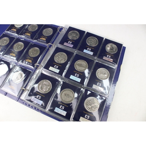 243 - A large collection of Royal Mint United Kingdom brilliant uncirculated £5 coins within a change chec... 