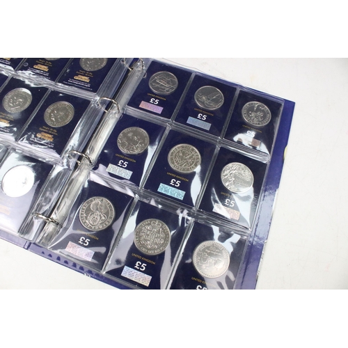 243 - A large collection of Royal Mint United Kingdom brilliant uncirculated £5 coins within a change chec... 