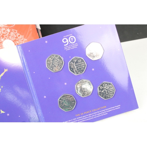 245 - A collection of coin collectors packs to include Royal Mint examples, 2016 Shakespeare £2 three coin... 