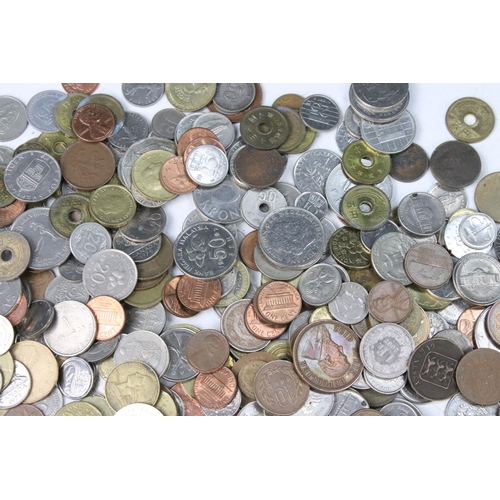 258 - A collection of mixed World coins to include a small quantity of silver examples.