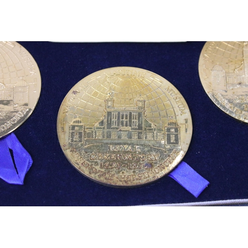 274 - A Royal Mint 300 Years of the Royal Greenwich Observatory three medallion set, gilt bronze, within f... 