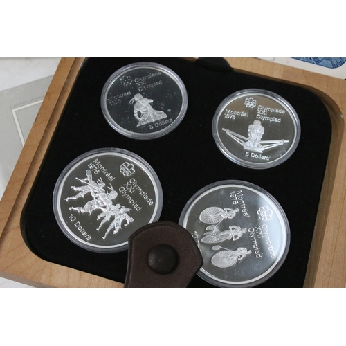 275 - A collection of seven Canadian 1976 Olympic silver proof coin sets, all encapsulated within original... 