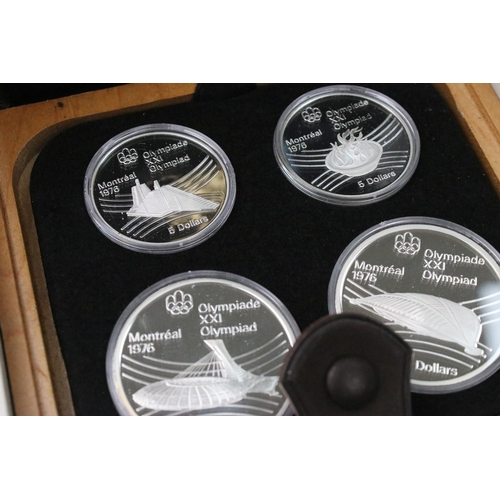 275 - A collection of seven Canadian 1976 Olympic silver proof coin sets, all encapsulated within original... 