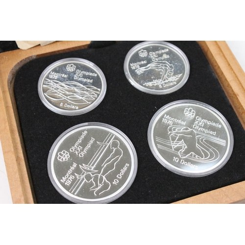 275 - A collection of seven Canadian 1976 Olympic silver proof coin sets, all encapsulated within original... 