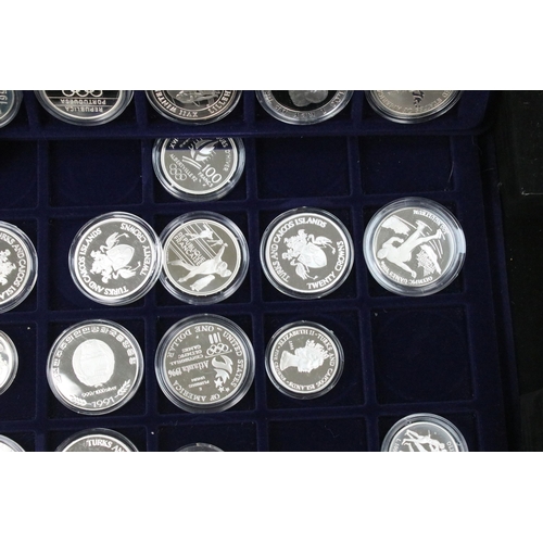 290 - A collection of thirty seven fine silver and sterling silver proof Olympic coins, all encapsulated w... 