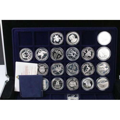 290 - A collection of thirty seven fine silver and sterling silver proof Olympic coins, all encapsulated w... 