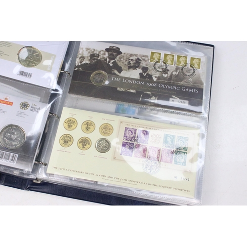 291 - A collection of Royal Mint / Royal Mail stamp & coin covers to include 50p, £1, £2 and £5 examples c... 