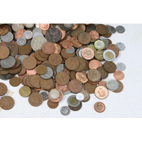 99 - A large collection of mixed British decimal, pre decimal and world coins to include some silver exam... 