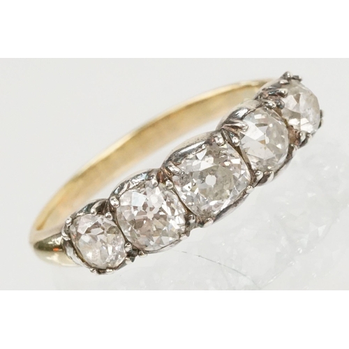 10 - 19th Century Victorian diamond five stone ring. The ring being set with five old cushion cut diamond... 