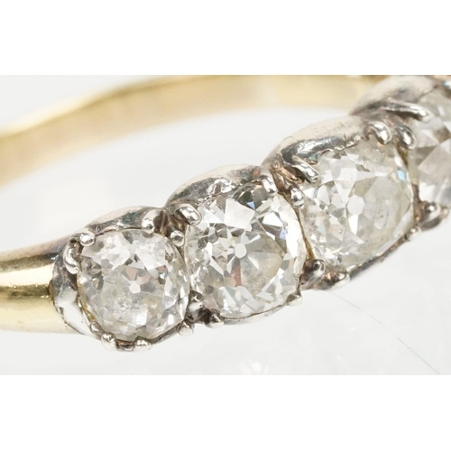 10 - 19th Century Victorian diamond five stone ring. The ring being set with five old cushion cut diamond... 