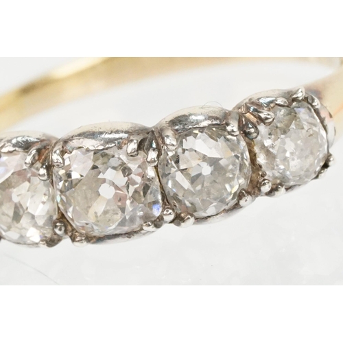 10 - 19th Century Victorian diamond five stone ring. The ring being set with five old cushion cut diamond... 