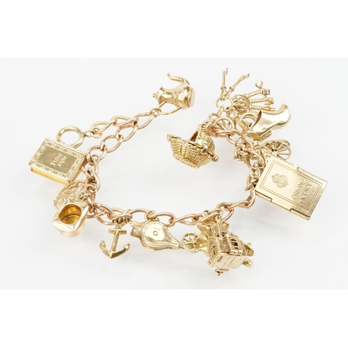 100 - 9ct gold charm bracelet with 14 gold charms on an oval link bracelet with spring ring clasp. Marked ... 