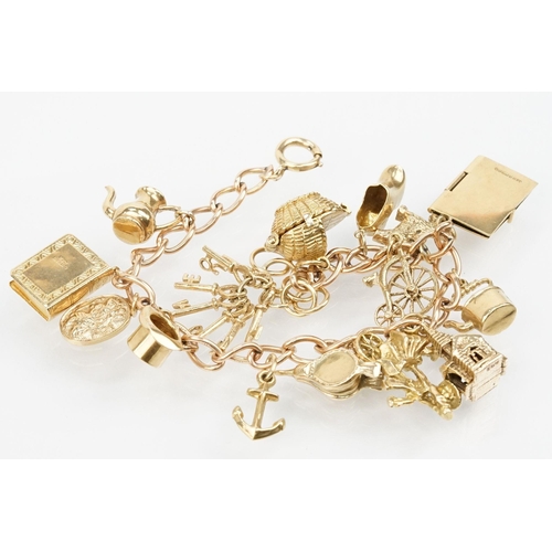 100 - 9ct gold charm bracelet with 14 gold charms on an oval link bracelet with spring ring clasp. Marked ... 