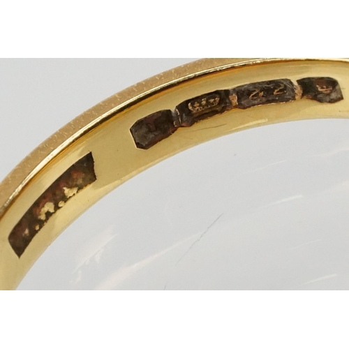 169 - 22ct gold wedding band ring. The ring of plain form. Hallmarked London 1954. Size O.