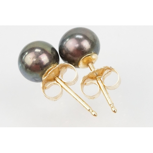 174 - Group of earrings to include a pair of 14ct black cultured pearl stud earrings (marked 585 to posts)... 