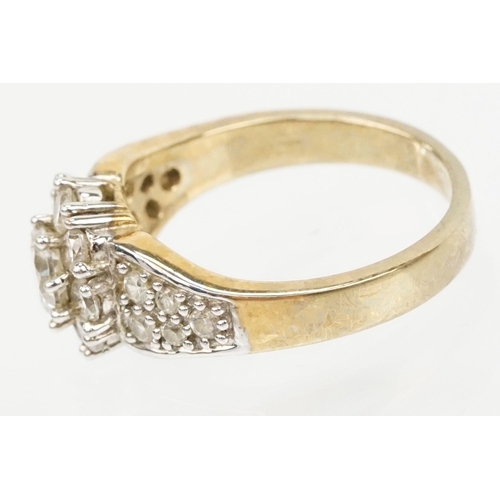 205 - 9ct gold and cz Windsor and Allen Princess Elizabeth two carat ring. The ring being set with a clust... 