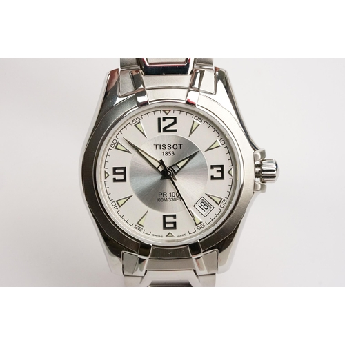 280 - Tissot PR 100 stainless steel wrist watch. The watch having a round face with white dial with arabic... 