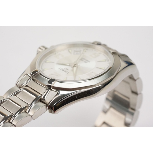 280 - Tissot PR 100 stainless steel wrist watch. The watch having a round face with white dial with arabic... 