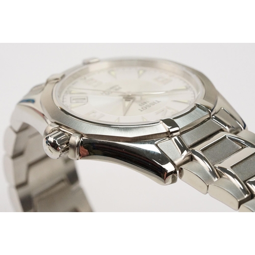 280 - Tissot PR 100 stainless steel wrist watch. The watch having a round face with white dial with arabic... 