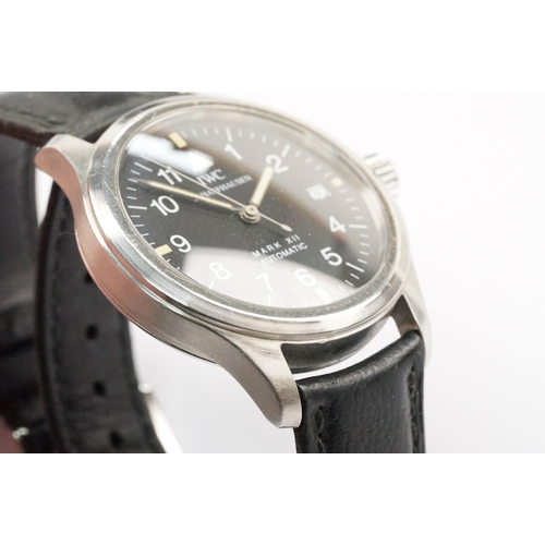 286 - IWC Mark XII automatic wristwatch having a black face with white enamelled arabic numerals to the ch... 