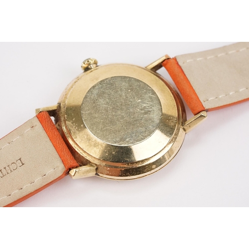 287 - Omega De Ville automatic wrist watch having a gilt face with baton markings to the chapter ring and ... 