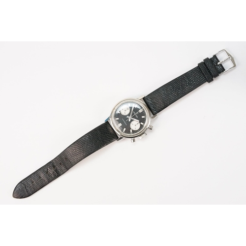 291 - Croton mid 20th Century chronograph wrist watch with reverse panda dial having a black face with two... 