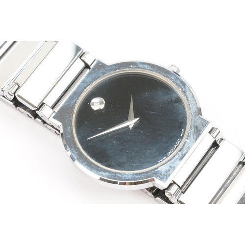 292 - Movado stainless steel wristwatch having a round black face with silver dot to twelve, mounted to a ... 