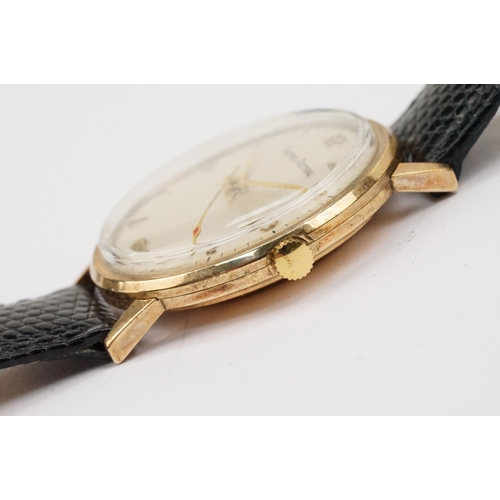 293 - 9ct gold case Smiths Astral wristwatch having a round face with triangular markings to chapter ring ... 