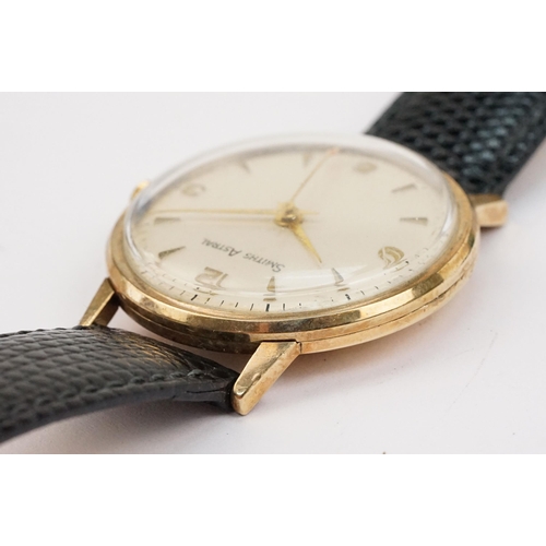 293 - 9ct gold case Smiths Astral wristwatch having a round face with triangular markings to chapter ring ... 