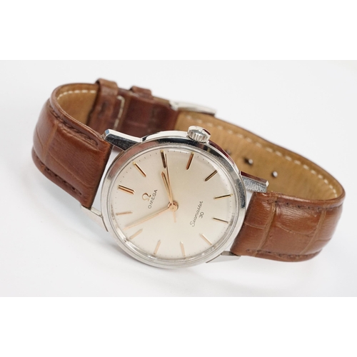 294 - Omega Seamaster 30 mid 20th Century vintage wrist watch. The watch having a silvered dial with gilt ... 