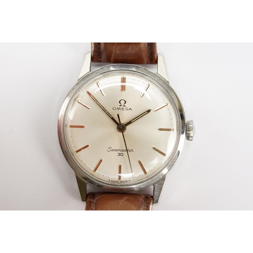 294 - Omega Seamaster 30 mid 20th Century vintage wrist watch. The watch having a silvered dial with gilt ... 