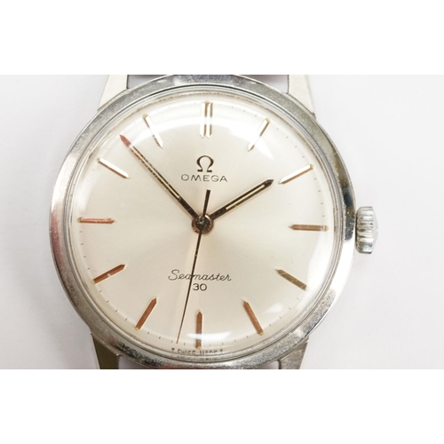 294 - Omega Seamaster 30 mid 20th Century vintage wrist watch. The watch having a silvered dial with gilt ... 