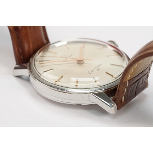 294 - Omega Seamaster 30 mid 20th Century vintage wrist watch. The watch having a silvered dial with gilt ... 