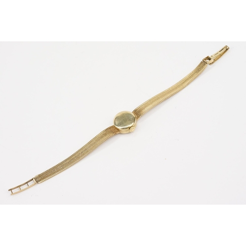 295 - 1970s 9ct gold Longines cocktail watch having a round face with baton markers to the chapter ring on... 