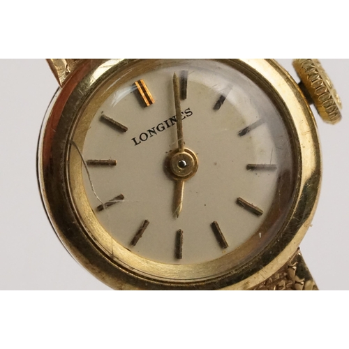 295 - 1970s 9ct gold Longines cocktail watch having a round face with baton markers to the chapter ring on... 