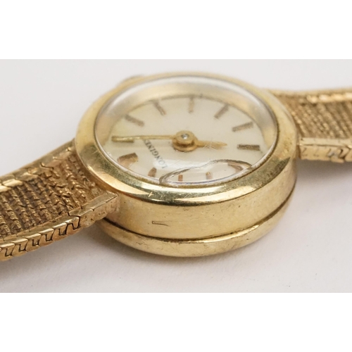 295 - 1970s 9ct gold Longines cocktail watch having a round face with baton markers to the chapter ring on... 