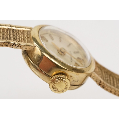 295 - 1970s 9ct gold Longines cocktail watch having a round face with baton markers to the chapter ring on... 