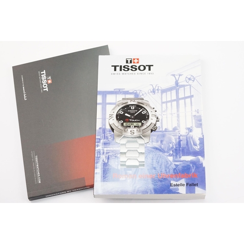 296 - Tissot chronograph automatic wrist watch having a round black face with three subsidiary dials, silv... 