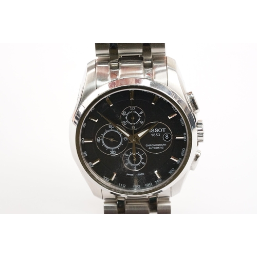 296 - Tissot chronograph automatic wrist watch having a round black face with three subsidiary dials, silv... 