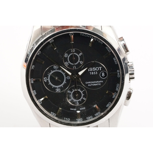 296 - Tissot chronograph automatic wrist watch having a round black face with three subsidiary dials, silv... 