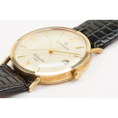 298 - 9ct gold Sovereign wrist watch having a round face with roman numerals to the chapter ring and date ... 