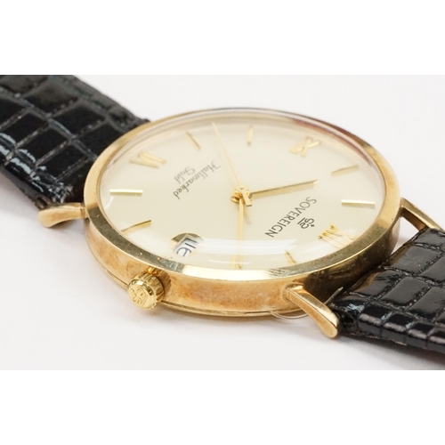 298 - 9ct gold Sovereign wrist watch having a round face with roman numerals to the chapter ring and date ... 