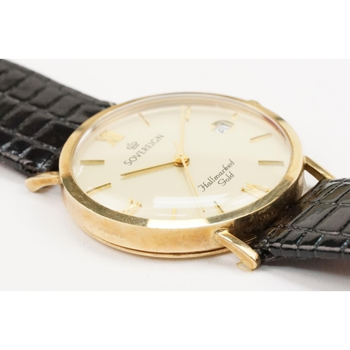 298 - 9ct gold Sovereign wrist watch having a round face with roman numerals to the chapter ring and date ... 