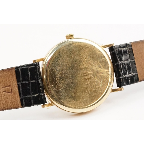 298 - 9ct gold Sovereign wrist watch having a round face with roman numerals to the chapter ring and date ... 