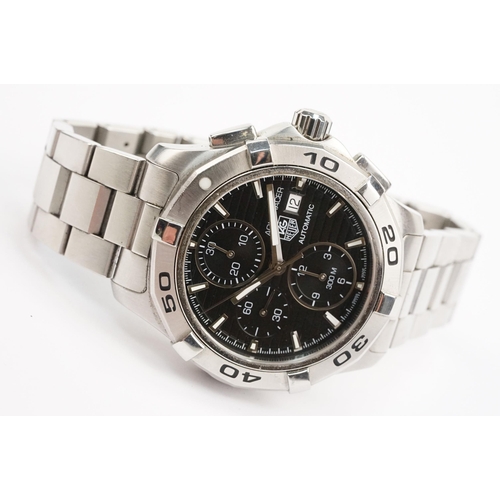 299 - Tag Heuer Aquaracer automatic wristwatch. The watch having a round black face with silver baton mark... 