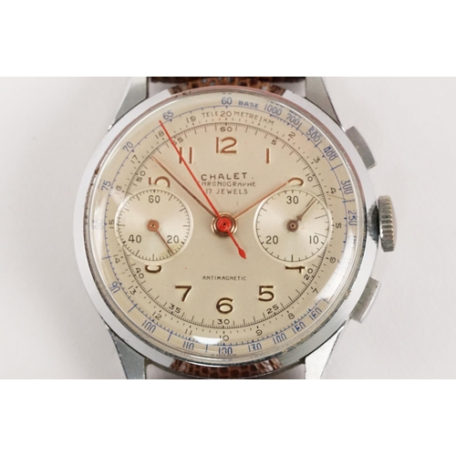 300 - Chalet chronograph mid 20th Century wrist watch having a white dial with gilt arabic numerals to the... 