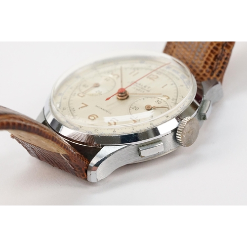 300 - Chalet chronograph mid 20th Century wrist watch having a white dial with gilt arabic numerals to the... 