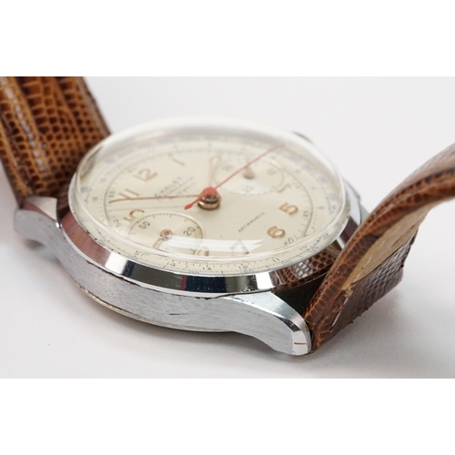 300 - Chalet chronograph mid 20th Century wrist watch having a white dial with gilt arabic numerals to the... 