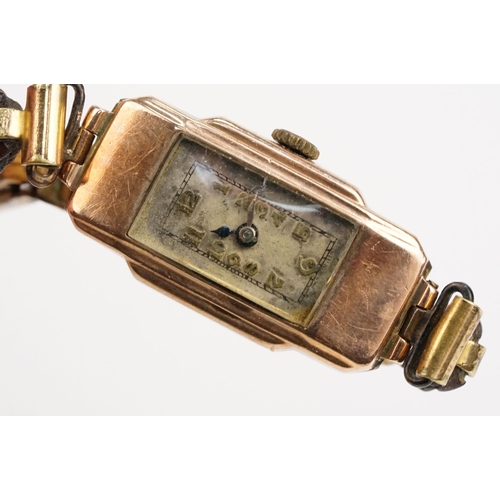 302 - 9ct gold Art Deco wrist watch having a rectangular face with arabic numerals to the chapter ring, mo... 